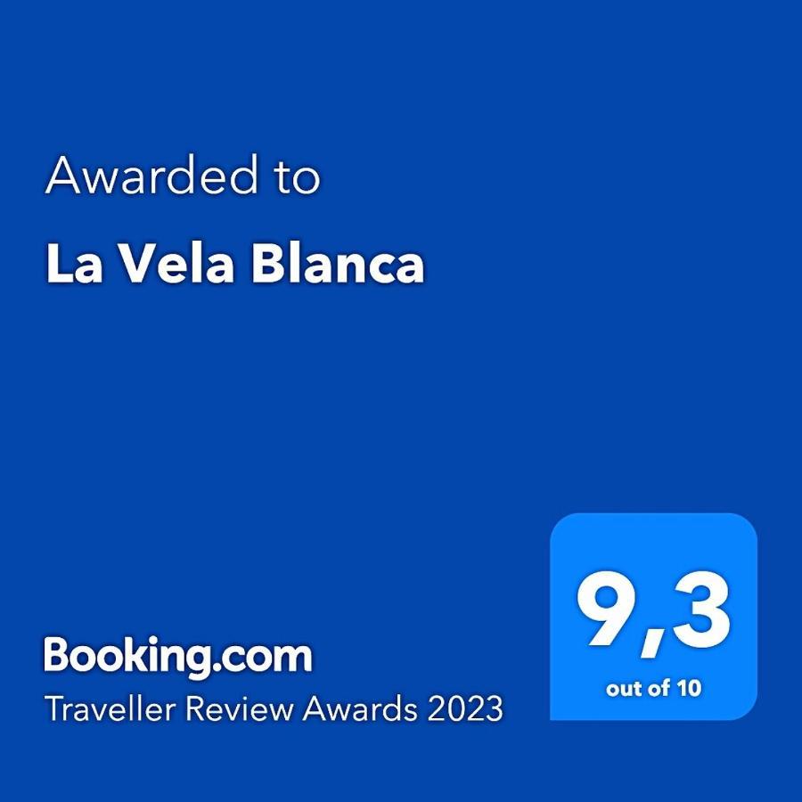 Appartamento La Vela Blanca Roses Esterno foto